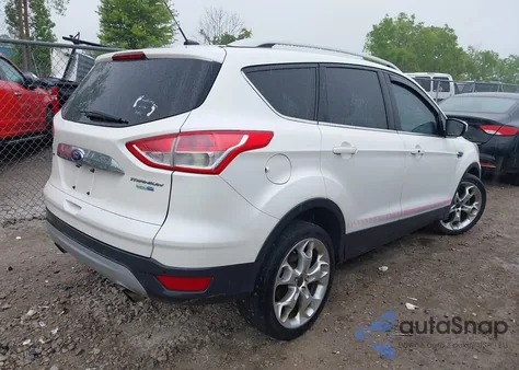 2014 Ford Escape Titanium z USA, uszkodzony, nr VIN 1FMCU9J92EUE22544
